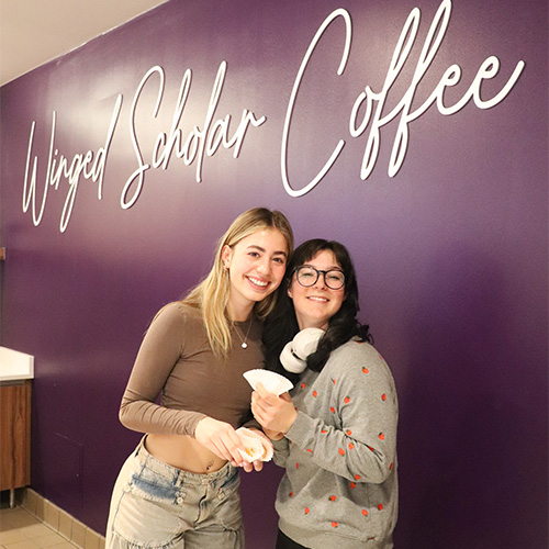 Two students at grand opening