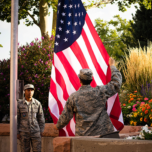 Veteran and active duty students at flag ceremony Veteran and active duty students at flag ceremony