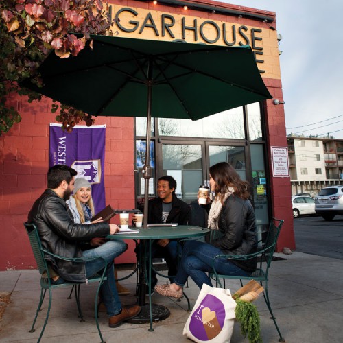 students dining at outdoor table