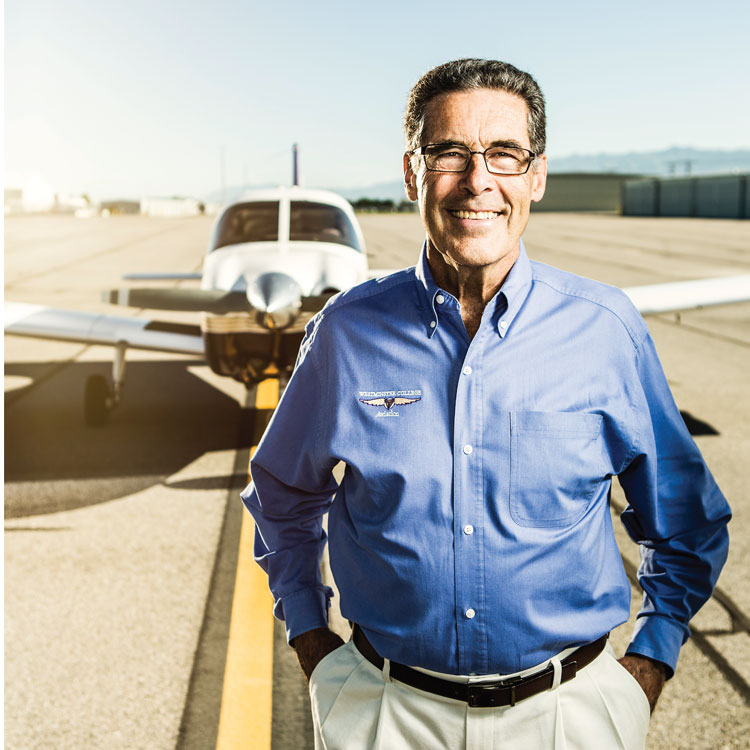 Gerry Fairbarin in front of plane