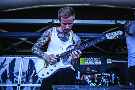 Dan Jones on stage with guitar