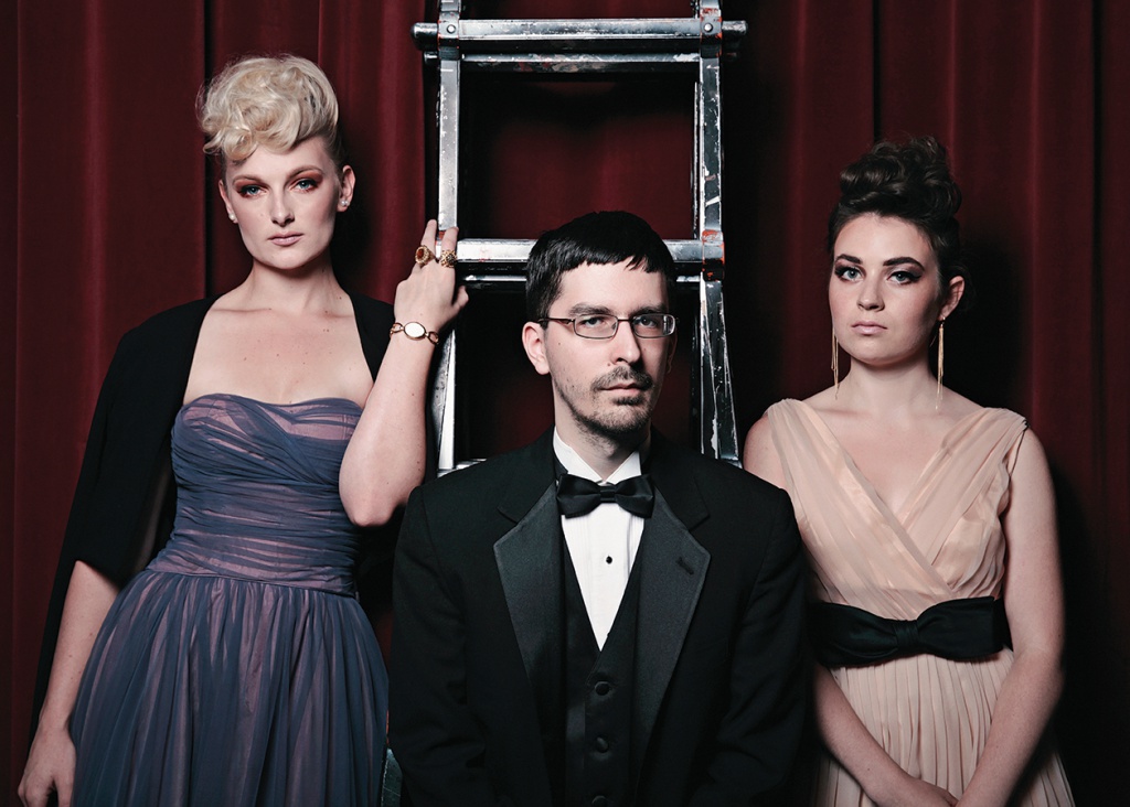 three music faculty members in formal wear