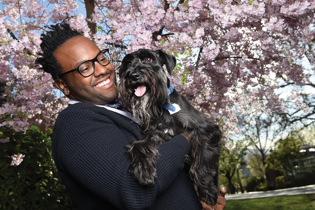 Assistant Dean of Students Karnell Black and dog Charlie