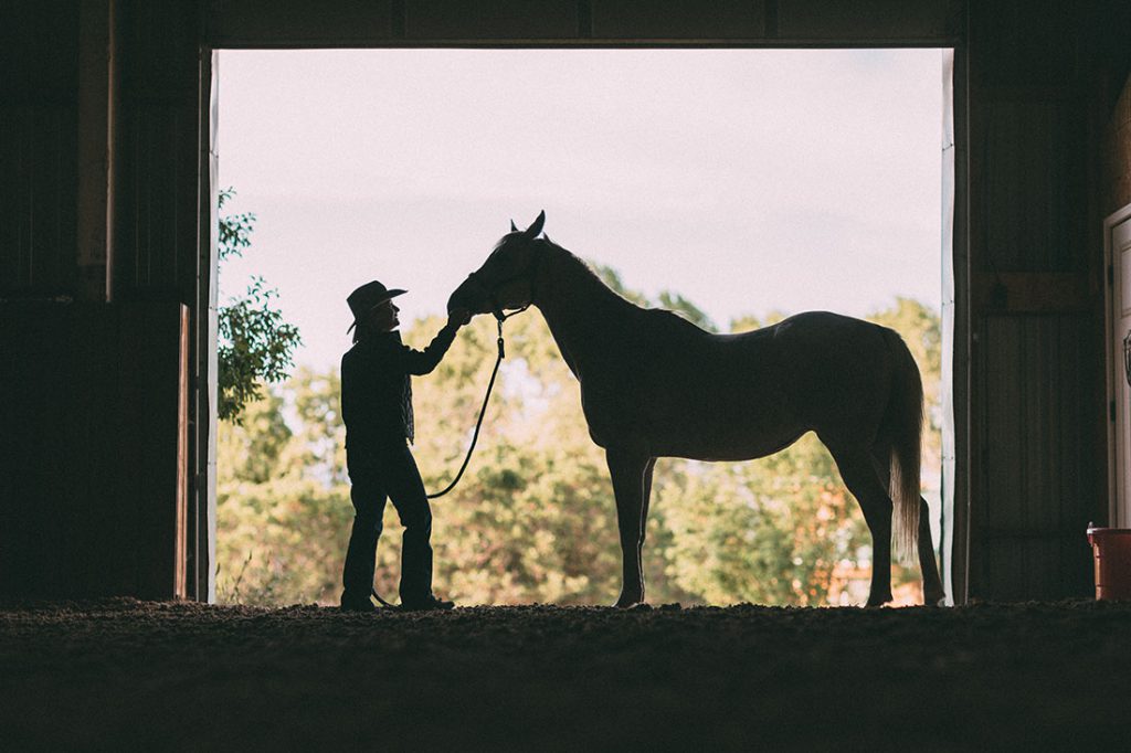 President Dobkin with her horse