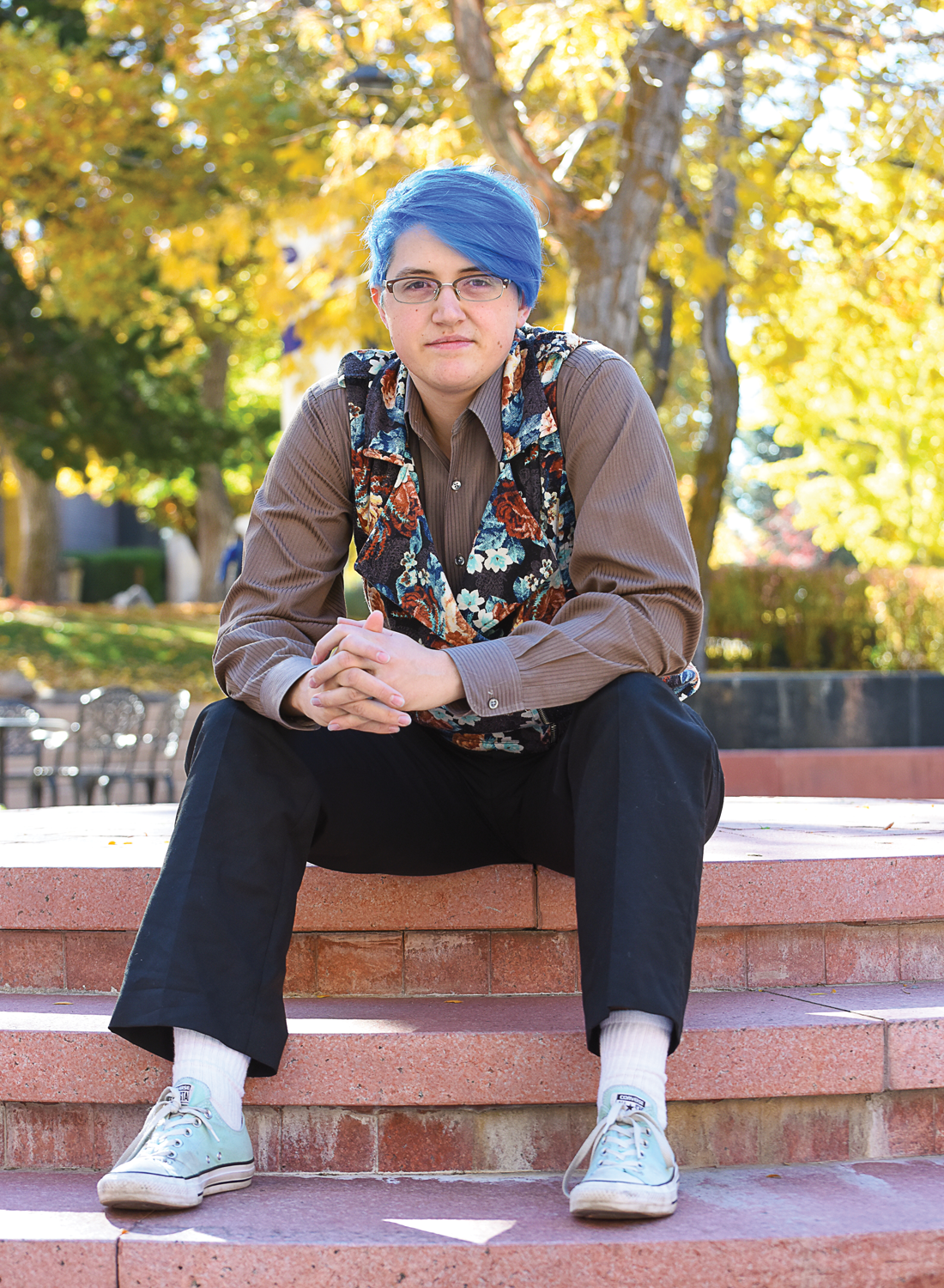 Mel Van De Graaf sitting in the Westminster College Richer Commons.