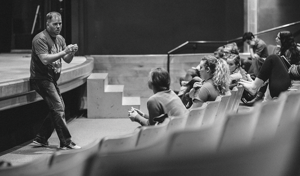 Professor Jared Larkin teaching a theater class to Westminster students.