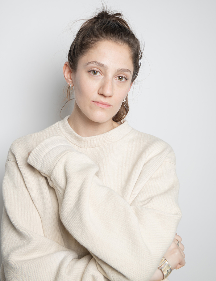 Eleanore Guthrie posing on a white backdrop