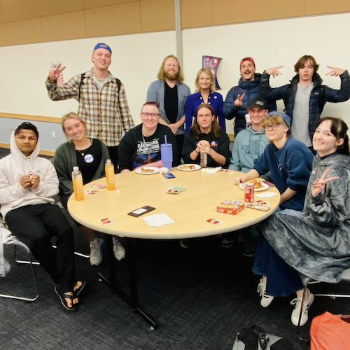 Students sitting around a table