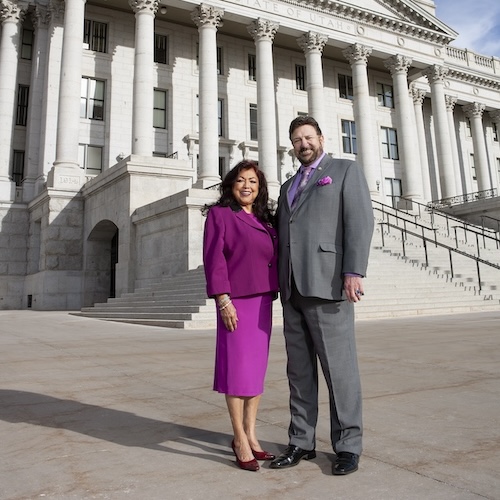 two people standing together