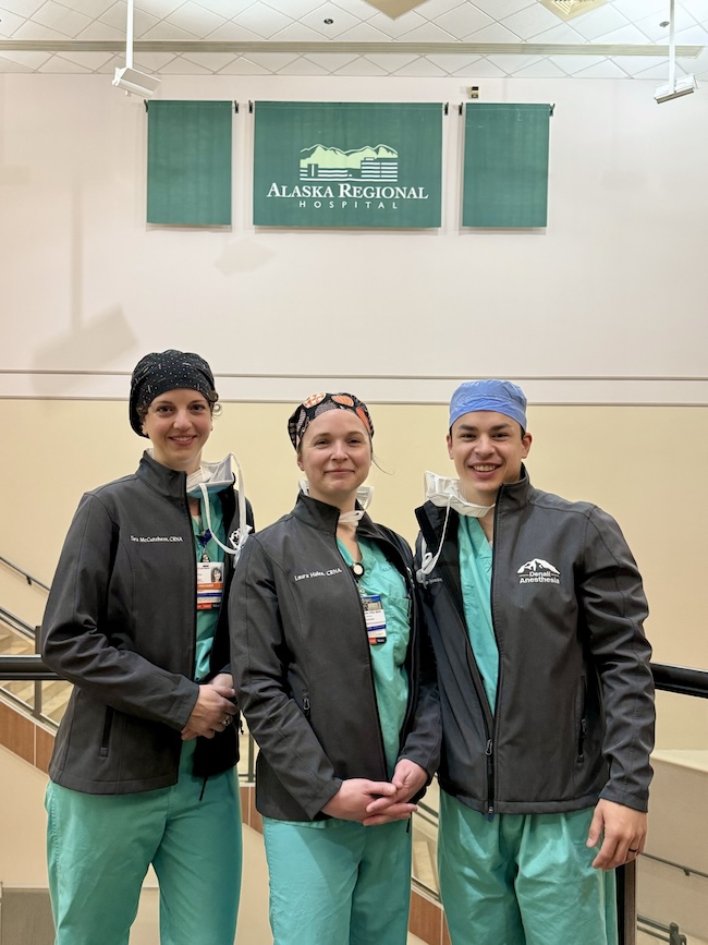 Three nursing students standing together