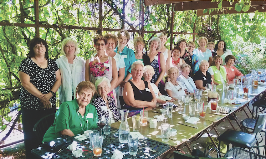 the Woman's Board at a picnic table